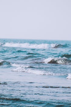 Gentle waves lapping on the shores of Tecolutla Beach, Veracruz, captured on a clear day.